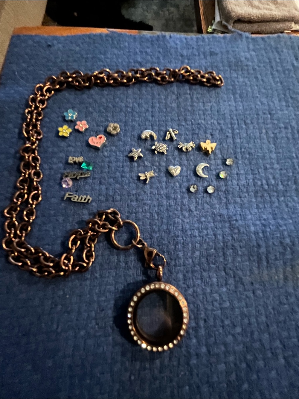 Round Locket Pendant Necklace with Charm in Bronze color